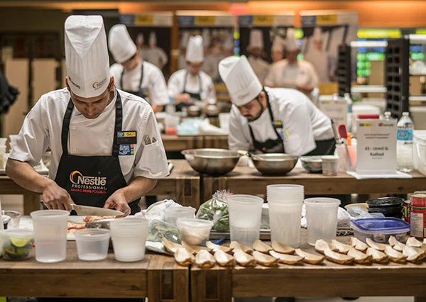 chef stirring in pot