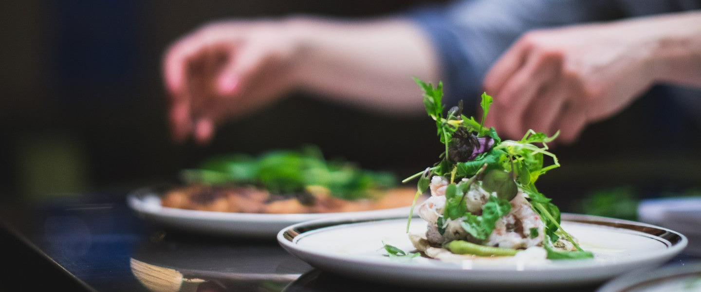 chef garnishing plates
