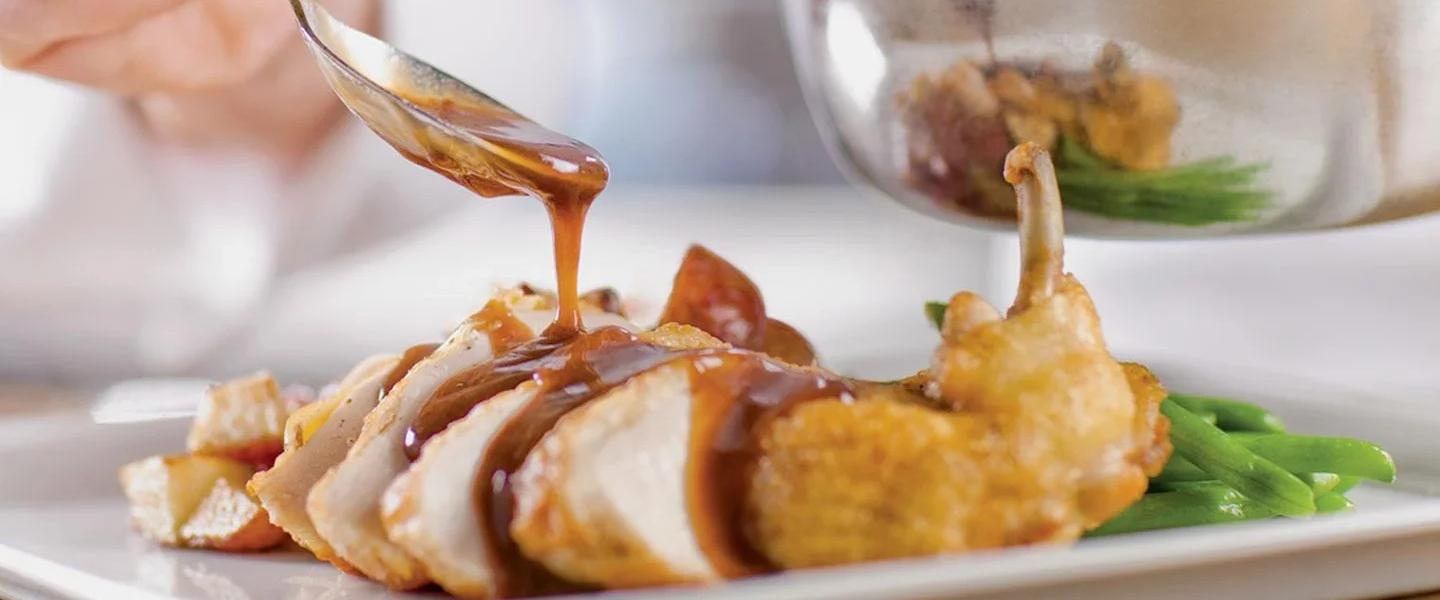 Gravy poured on chicken